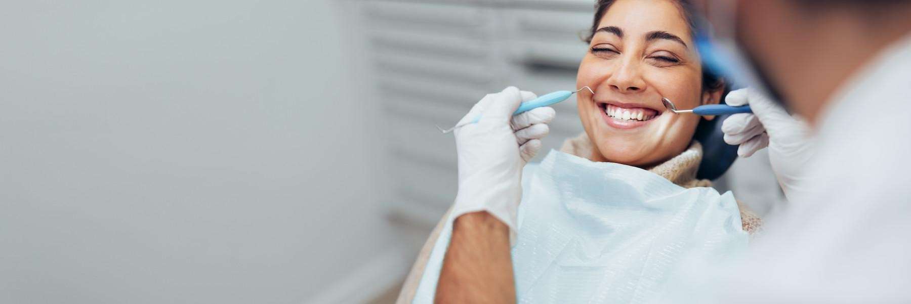 woman smiling in dental chair in havertown